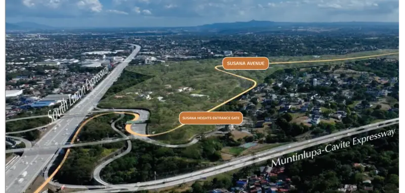 Aerial view of Susana Avenue winding from the Susana Heights entrance gate beside the Muntinlupa–Cavite Expressway